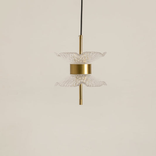 Gold pendant light with clear textured glass shades shown on a bright white background with lights turned off for a minimal look.
