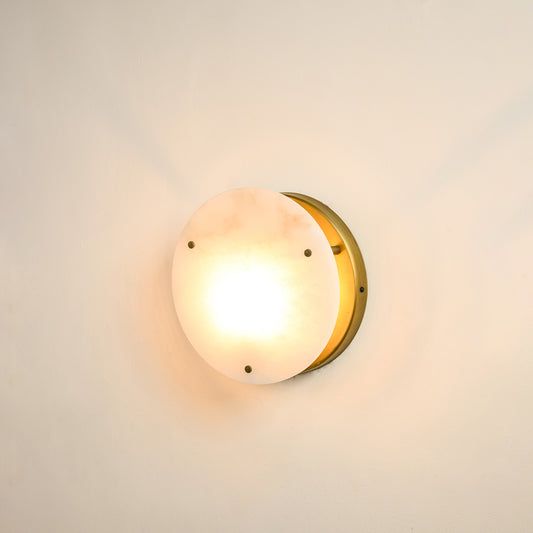 Modern marble wall light with warm ambient glow for elegant hallway and luxury decor styling spaces.
