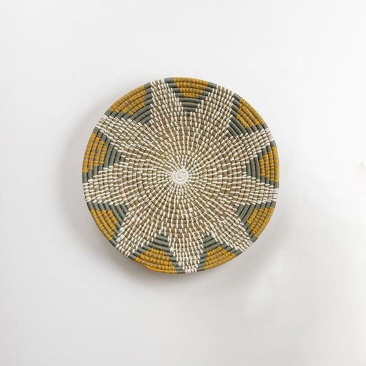 White decorative wall plate with gold floral lattice pattern for contemporary wall styling and luxury home decor.