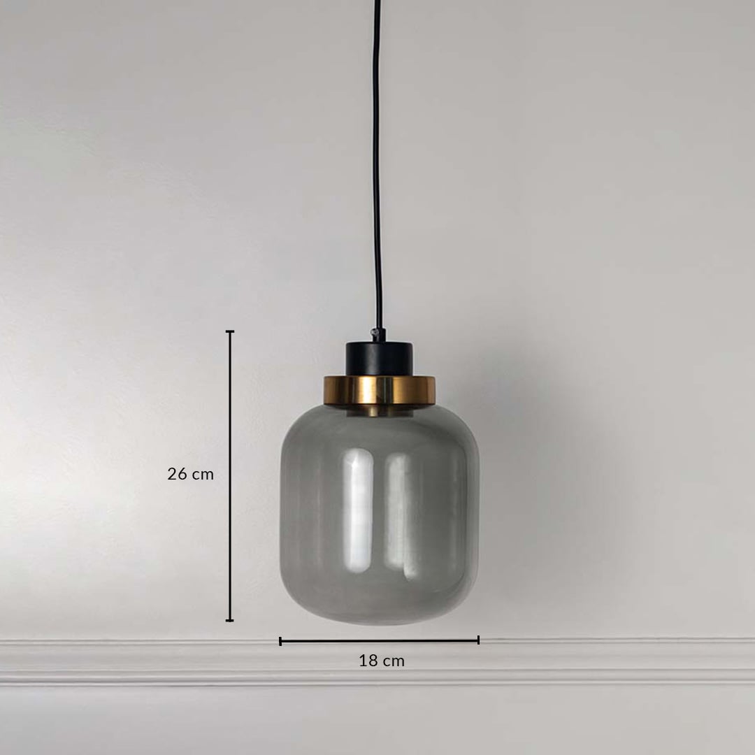 Smoked glass pendant light with golden detail measured 26x18 cm modern hanging lamp for dining table and living room decor.