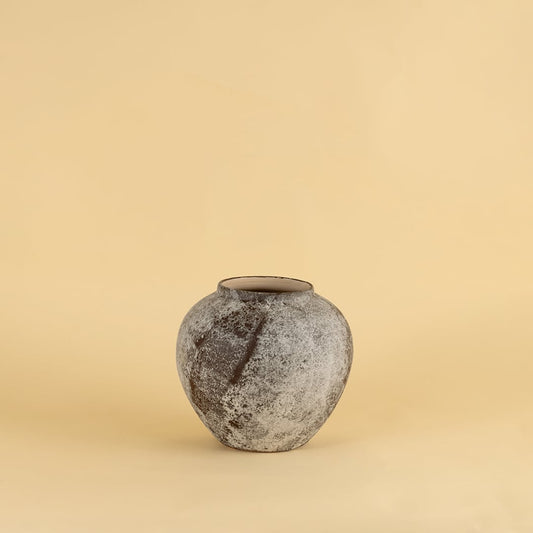 Round rustic ceramic vase with grey and brown textured finish ideal for modern and traditional interiors.