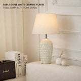 Sable Shine White Ceramic Flakes Table Lamp with Ivory Shade