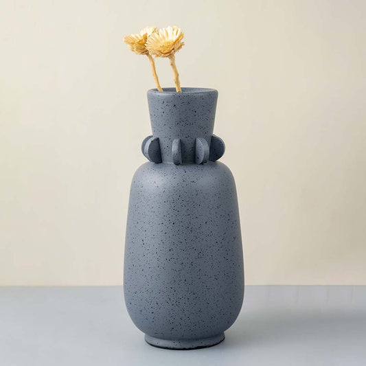 Sasa sculpture vase on white background featuring artistic ceramic form smooth surface and statement design for modern interior decor styling.