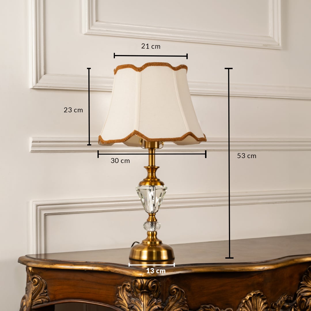 Gold and crystal table lamp with cream fabric shade dimensions height 53 cm width 30 cm top 21 cm base 13 cm table lamp.