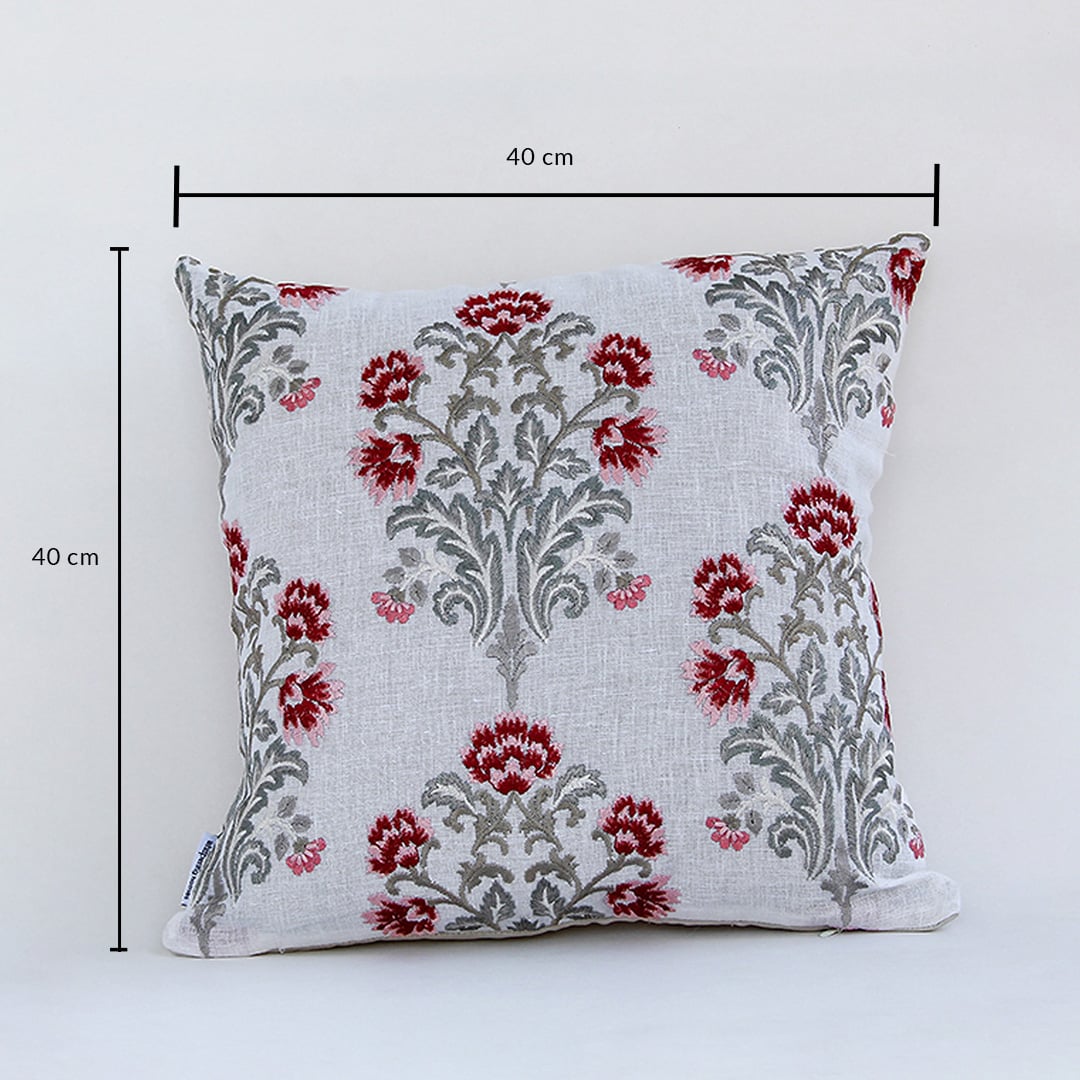Cotton cushion with red and grey embroidered floral design measured at 40 cm by 40 cm displayed on a white background showing its square decorative shape.