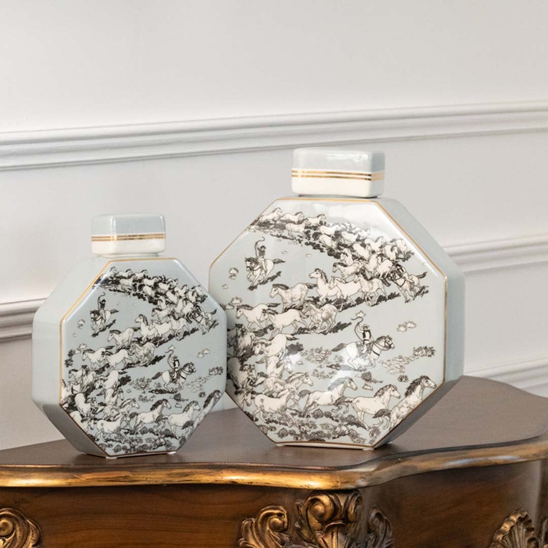 Pair of white octagon ceramic jars with grey floral artwork in a front view ideal for elegant home décor and minimalist tabletop styling.