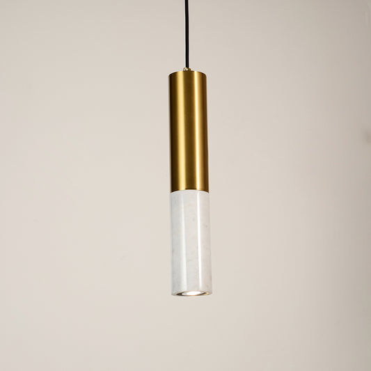 Clear glass and gold metal tube pendant light illuminated to showcase refined modern decorative ceiling lighting.