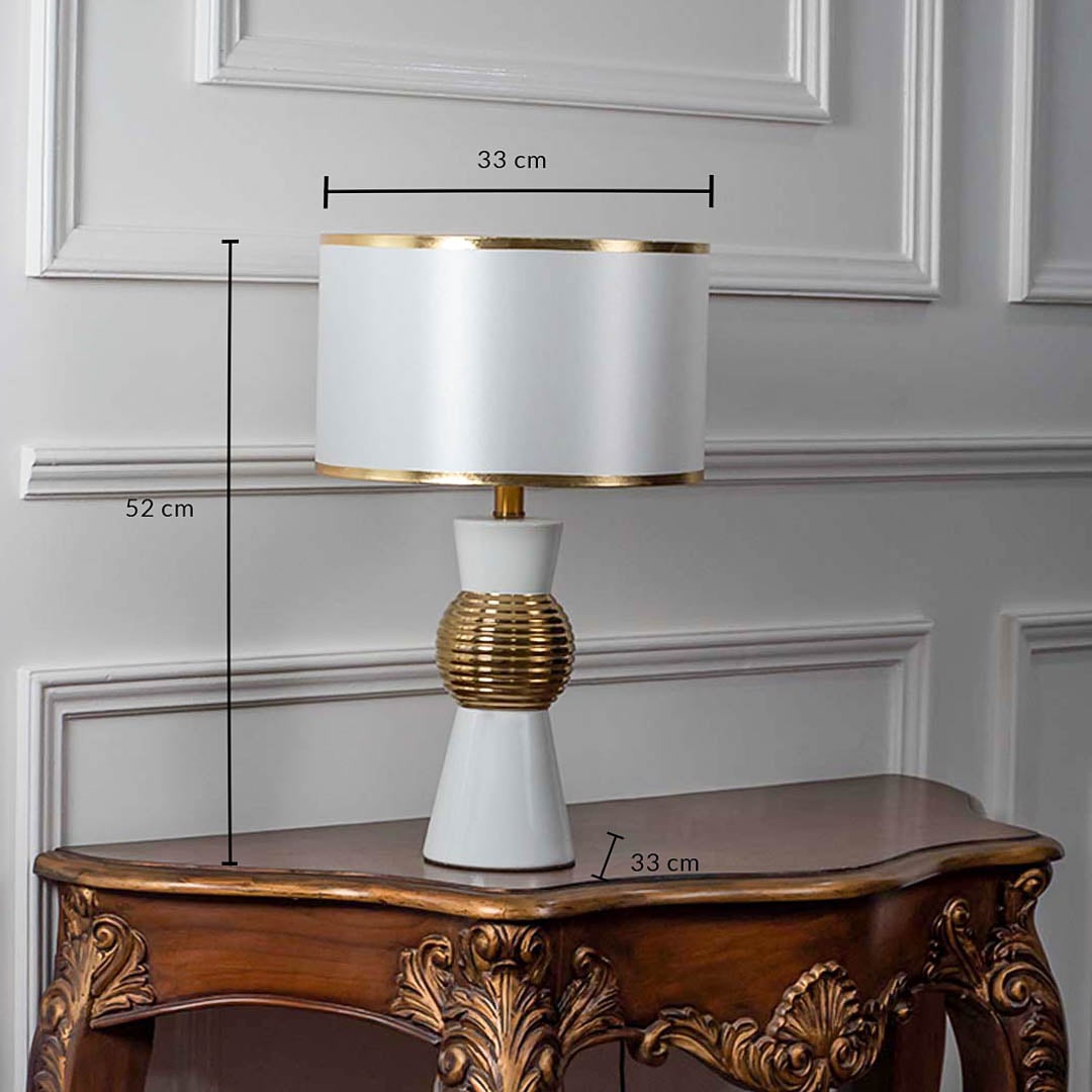 Dimensions of white and gold table lamp with textured golden round base measuring 52 cm height and 33 cm width.