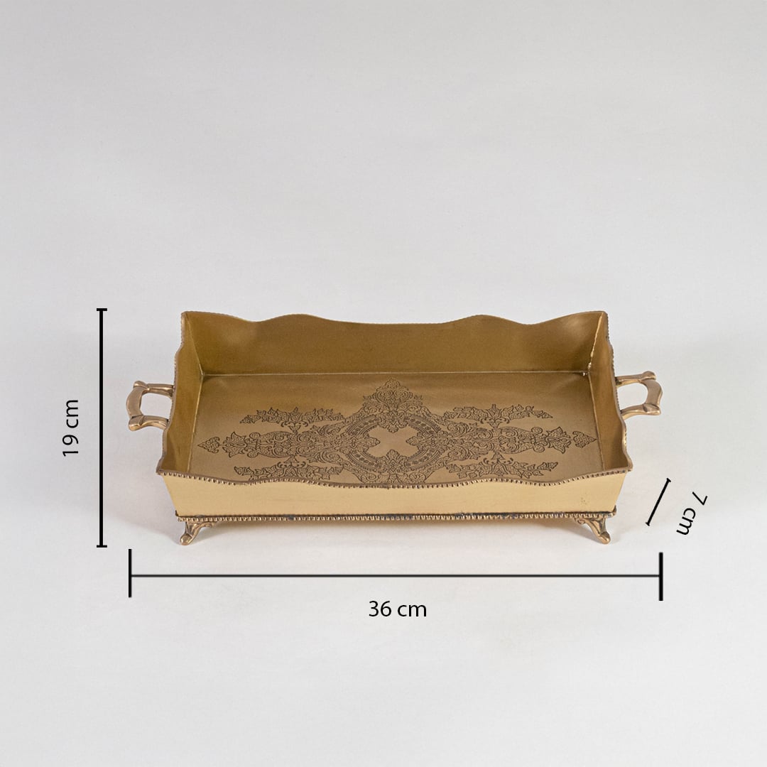 Gold brass tray with floral base engraving shown with size 30 cm length 19 cm width and 5 cm height on white.