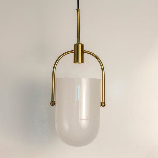 White frosted glass pendant light with gold frame crafted for elegant bedrooms and living spaces.