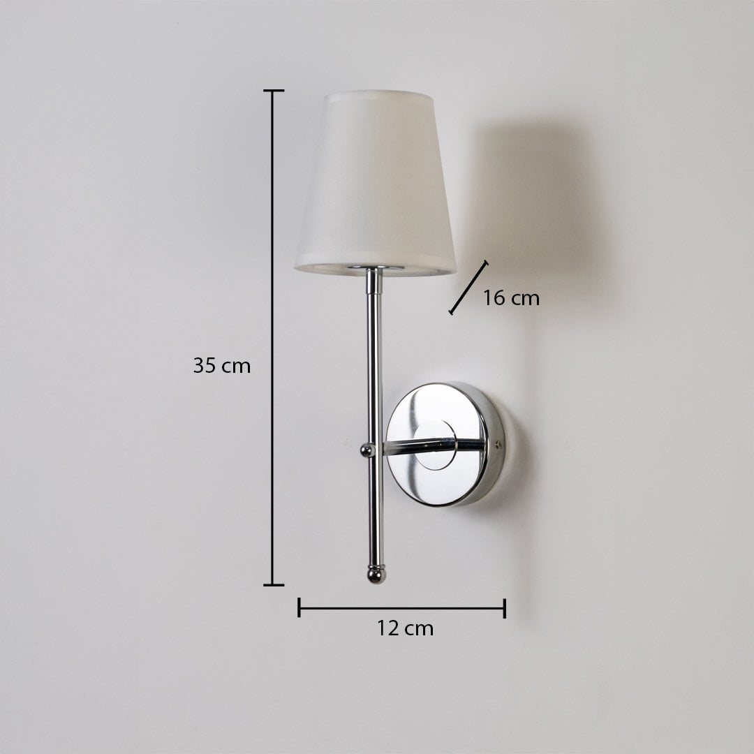 Chrome metal wall light with white fabric shade shown with 35 cm height 12 cm width and 16 cm depth for precise modern indoor wall placement.
