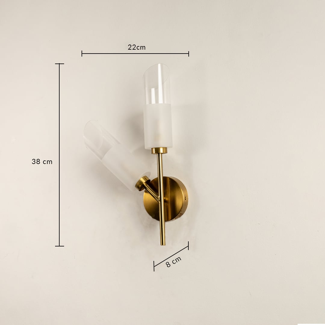 Brushed gold dual wall light with frosted glass shades measuring 38 cm height 22 cm width and 8 cm depth shown clearly for accurate placement.
