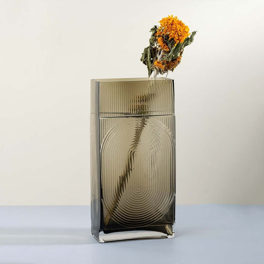 Rectangular ribbed glass vase in smoke brown finish modern geometric design decorative accent light on white background for home decor.