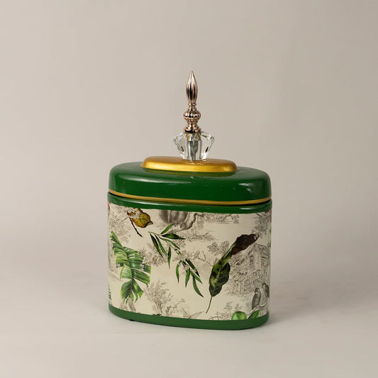 Side view of green tropical jar showing smooth rounded edges glossy finish and detailed tropical prints.