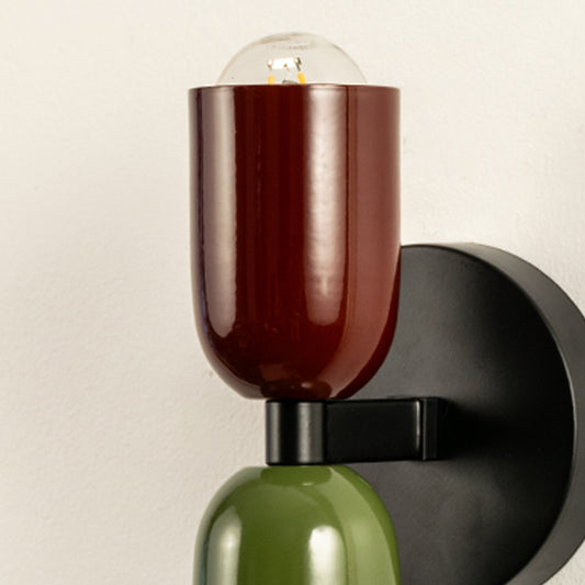 Modern multicolor wall light with artistic metallic finish for stylish contemporary interior decor.