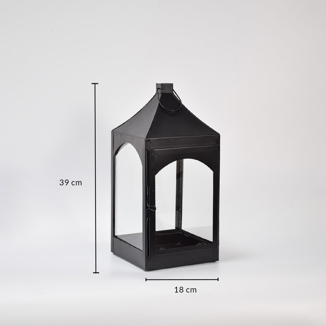 Tall black metal lantern with pointed top showing 50 cm height and 20 cm width dimensions designed for statement floor decor styling.