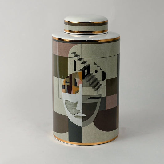 Abstract Face ceramic jar on a white background showcasing its detailed geometric art pattern and gold rim finish.