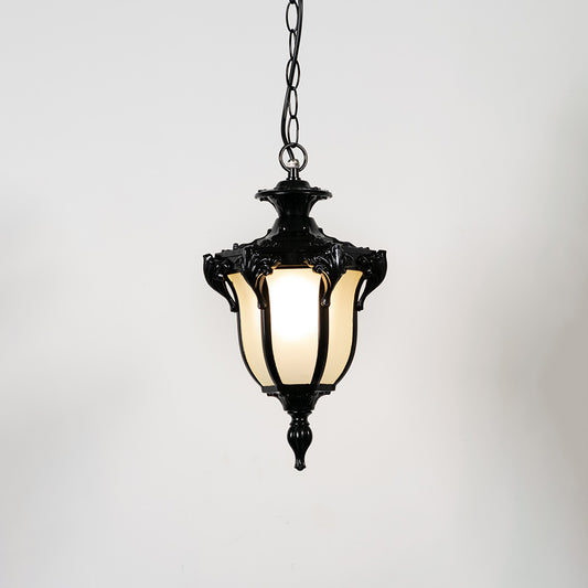 Decorative black metal hanging lantern light with frosted textured glass for stylish patio decor.