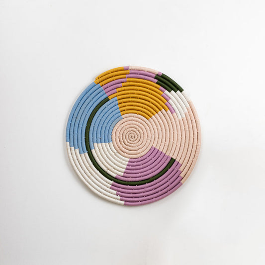 Pastel multicolor decorative wall plate with geometric pattern for artistic wall styling and contemporary home decor.