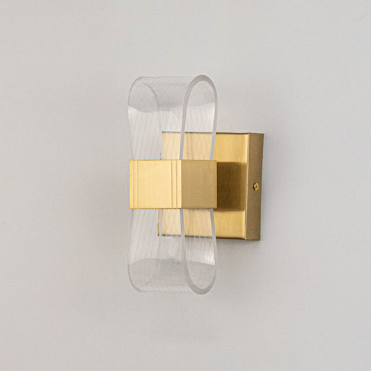 Contemporary wall light in gold metal finish with layered glass design for bedroom or living decor lighting placement white background.