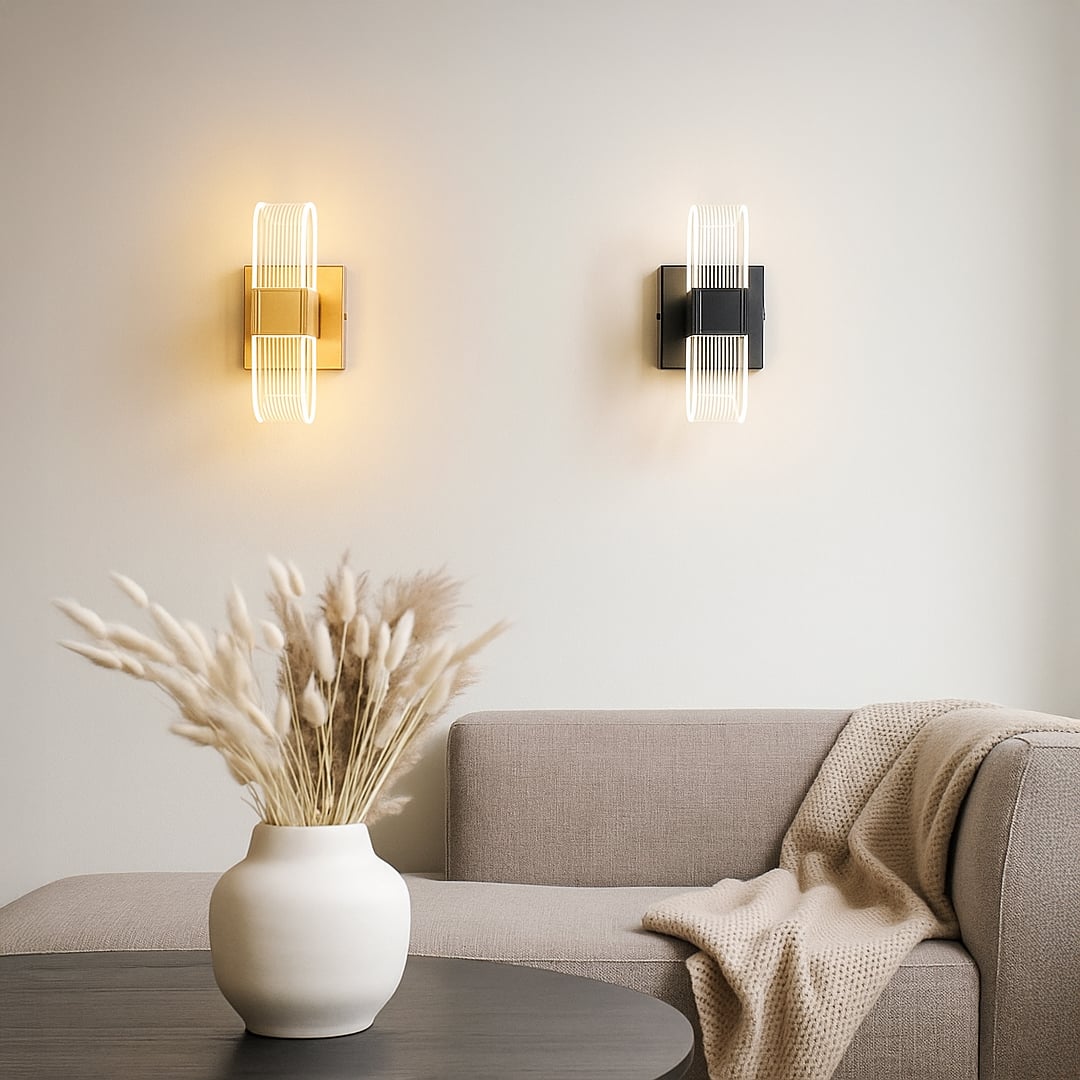 Set of black metal wall lights with ribbed clear glass shades adding warm balanced lighting to a modern space.