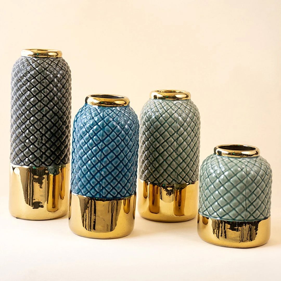 Decorative ceramic vase with teal textured body and gold finish showcased as part of a coordinated home decor collection for stylish interiors.