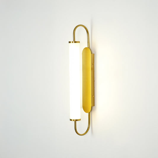 Gold metal wall light on white background with frosted glass shade for elegant minimalist interior decor.