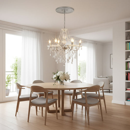 Silver metal crystal chandelier adds bright elegant lighting to living room or dining room ceilings creating a luxury ambience.