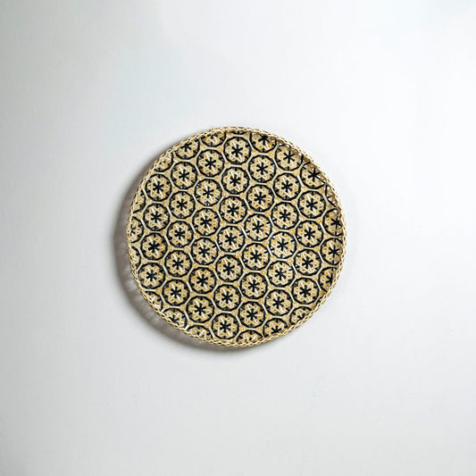 Natural decorative wall plate with intricate geometric pattern for artistic wall styling and modern home decor.