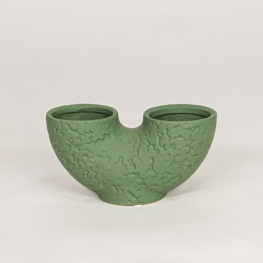 bandsaw textured ceramic vase green white background