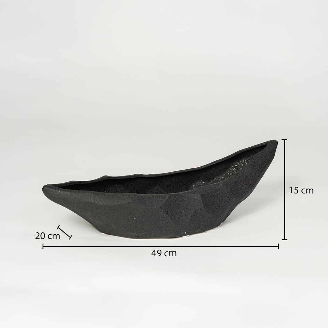 Black ceramic decorative platter measuring 49 cm length 20 cm width and 15 cm height ideal for modern table decor styling.