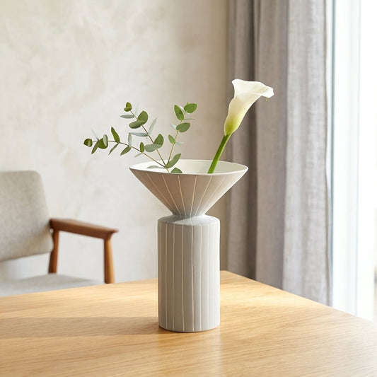 White ceramic flower vase placed on wooden table modern decorative vase for living room console home decor styling.