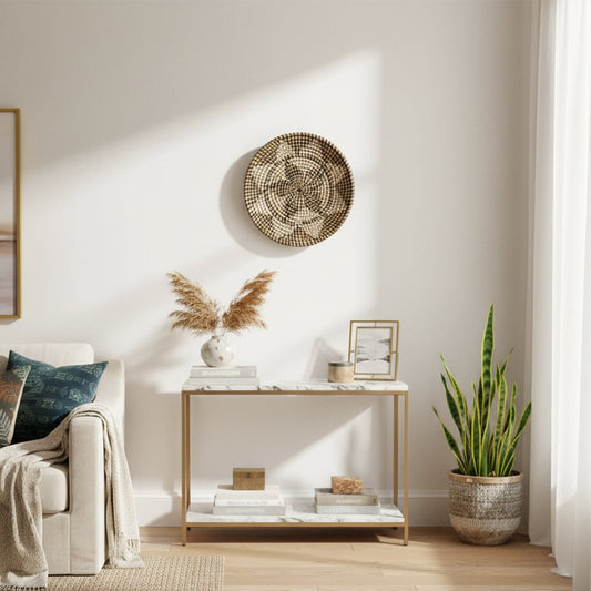 Round woven wall basket placed above a console table adding organic charm and balanced texture to a sunlit modern living space.