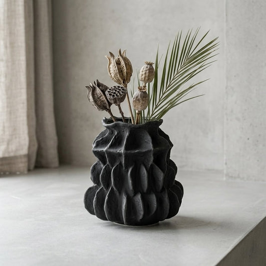 black textured round ceramic vase main lifestyle