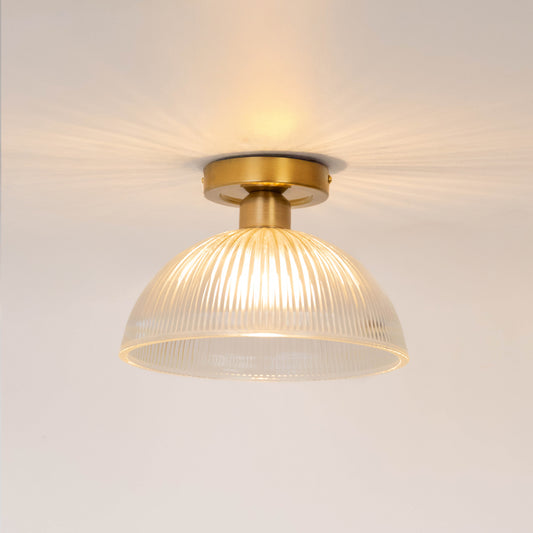 Modern gold metal ceiling light with frosted white glass globe for luxury living room and premium decor spaces.