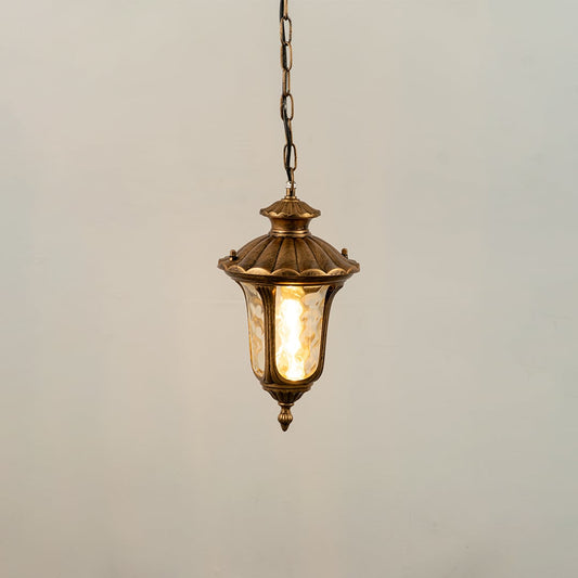 Gold metal outdoor hanging lantern light on with textured glass panels casting warm glow ideal for balcony patio pathway and entryway lighting Decor.