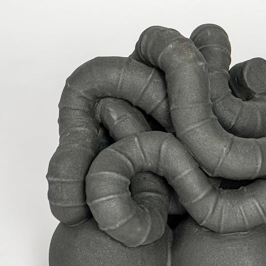 Black ceramic abstract decor sculpture modern decorative showpiece for table console shelf home decor styling.