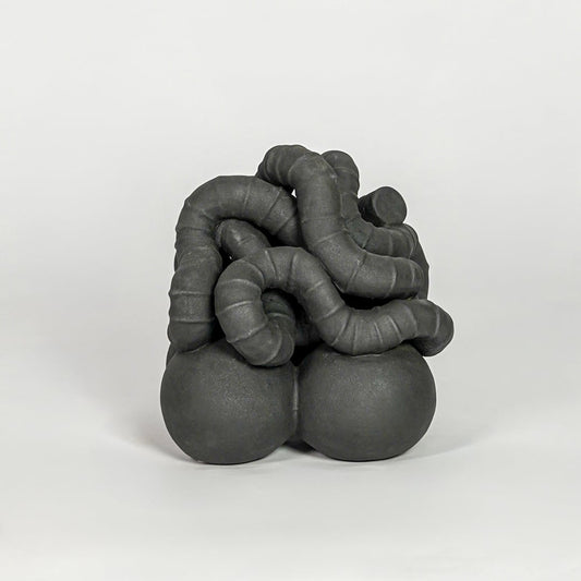 Black ceramic abstract decor sculpture modern decorative showpiece for table console shelf home decor styling.