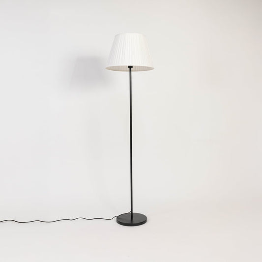 Pleated floor lamp with light off showcasing classic design on white background.