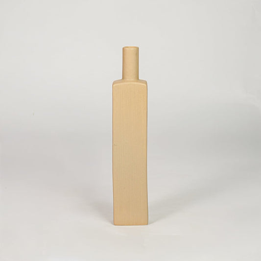 Yellow ceramic tall decorative vase with ribbed texture modern flower vase for tabletop shelf console living room decor styling.