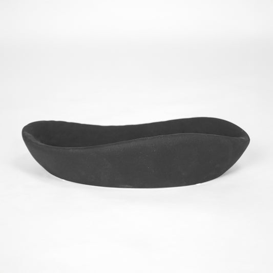 Black ceramic decorative tray for stylish coffee table placement and contemporary indoor decor styling accent piece.