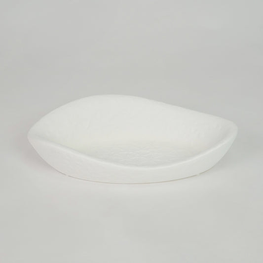 White ceramic decorative tray for modern coffee table placement and elegant indoor home decor styling accent piece.