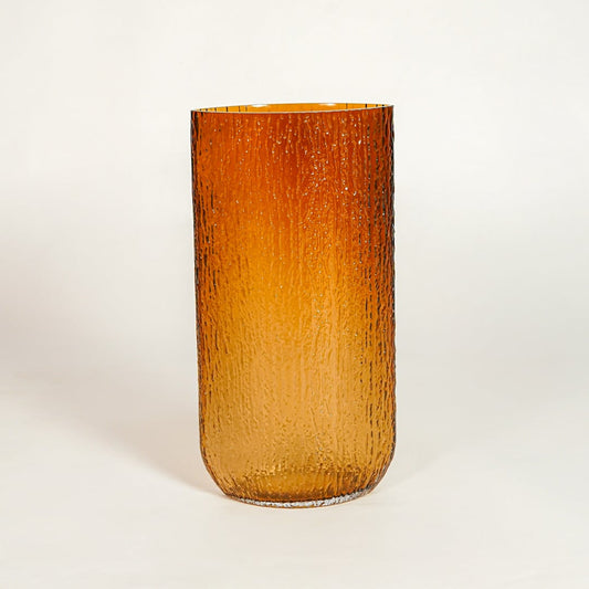 Amber decorative textured glass vase on white background modern home decor accent piece for table floor console styling interior.