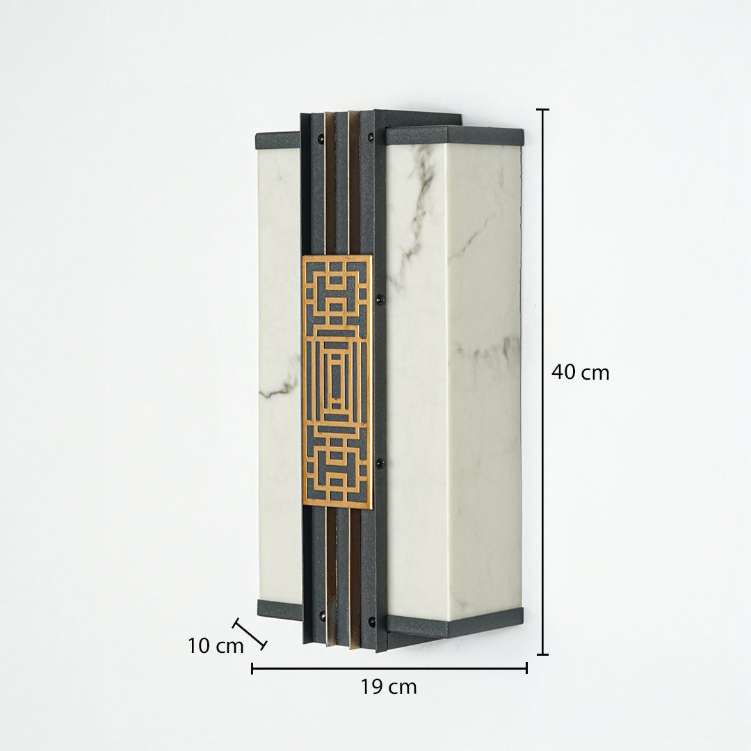 Modern wall light with marble finish panels and gold geometric detail on neutral background 40 cm height 19 cm width 10 cm depth perfect for exterior lighting decor.