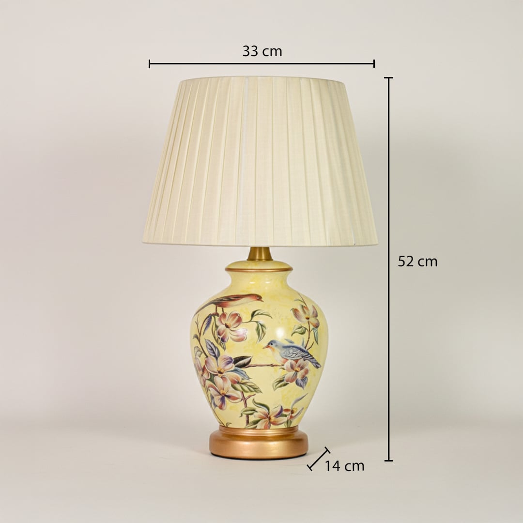 Yellow ceramic table lamp showing 52 cm height 33 cm shade width and 14 cm base diameter ideal for bedside placement.