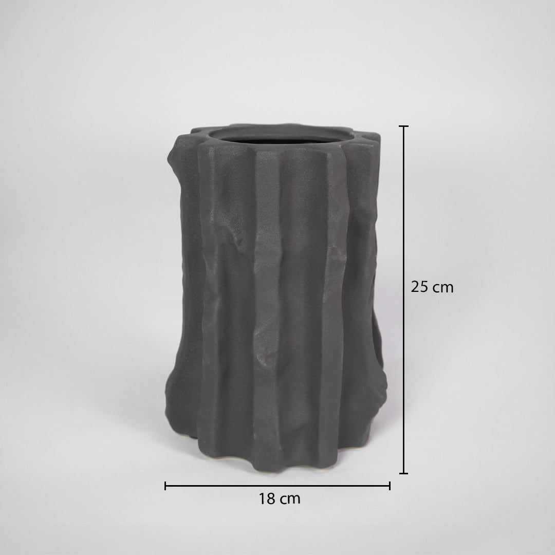 Black textured ceramic vase dimension image with 25 cm height and 18 cm width for stylish shelf decor.