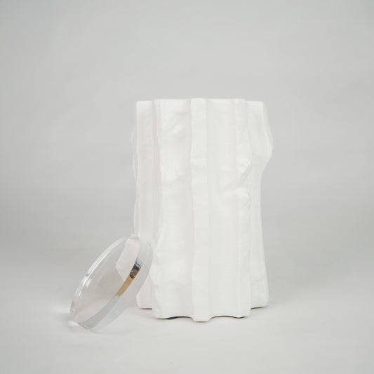 White textured ceramic candle jar for modern coffee table placement and elegant indoor decor styling accent piece.