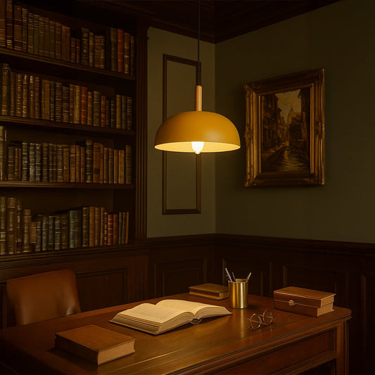 Yellow dome pendant light in a classic library setting with wooden desk and bookshelves providing warm ambient lighting for vintage home decor.