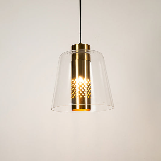 Clear glass pendant light with gold metal finish illuminated beautifully for elegant ceiling lighting decor.