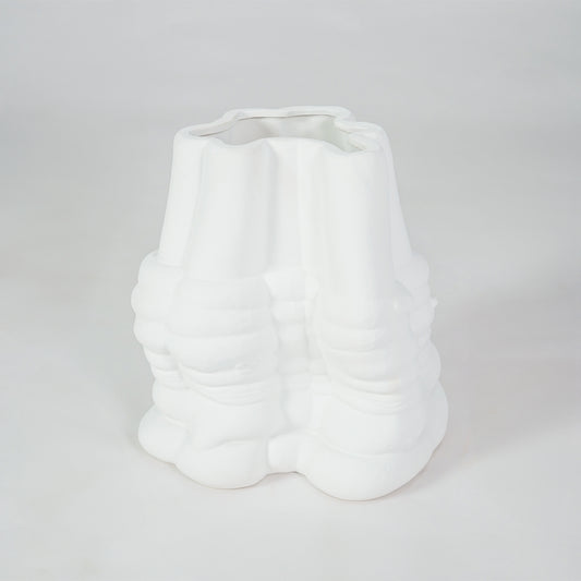 White textured ceramic vase on white background for elegant modern tabletop home decor styling.